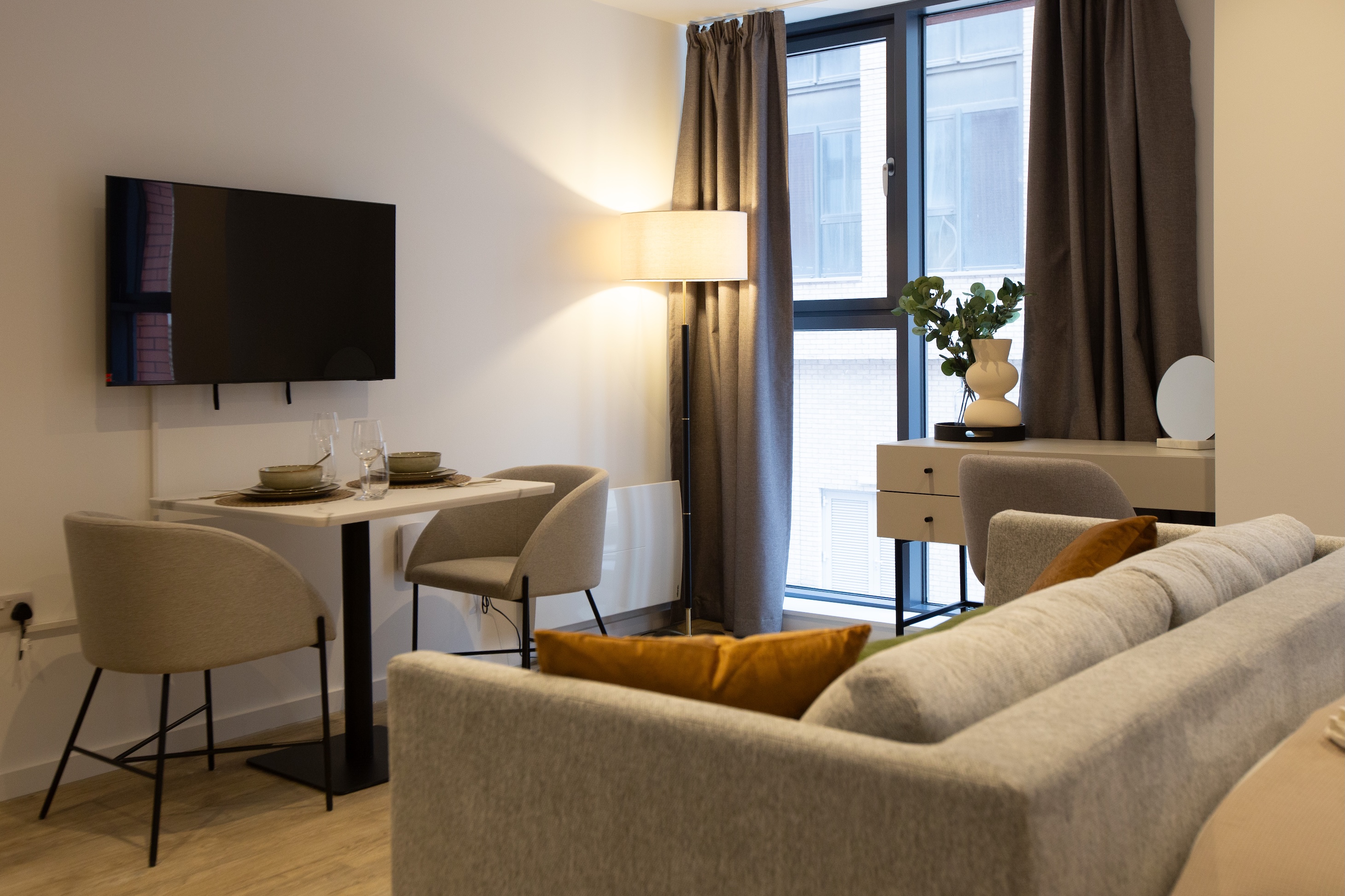 Living Room with TV in Apartment 1