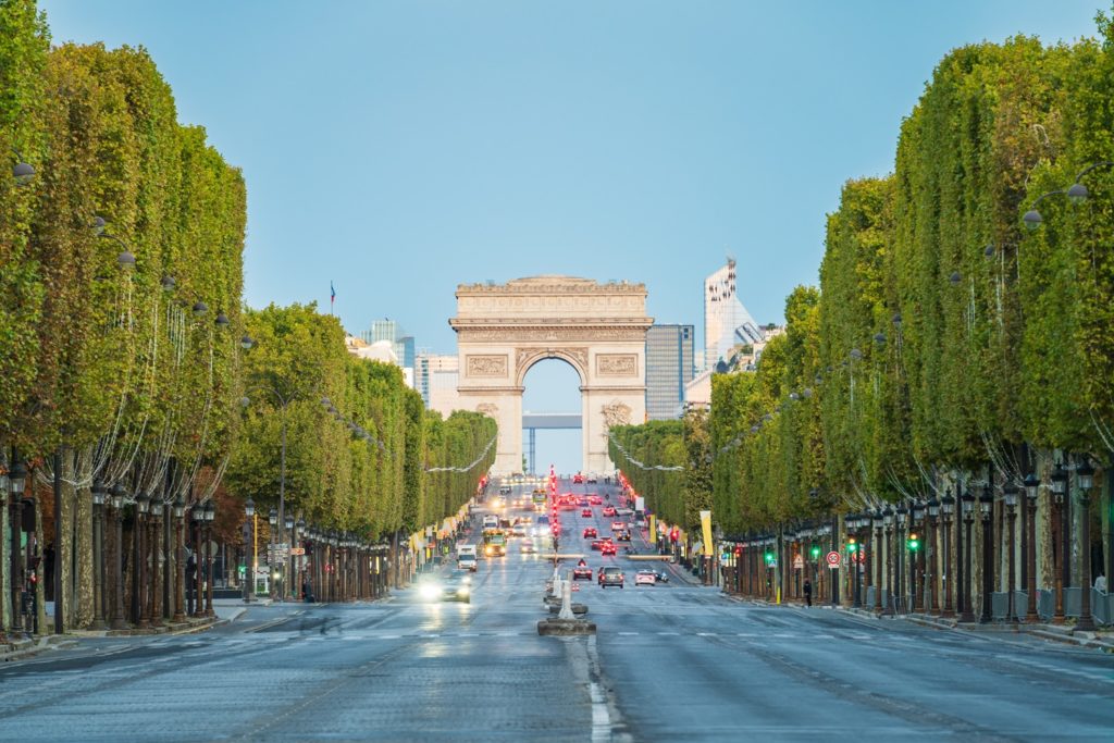 The Arc de Triomphe seen across des Champs-Élysées avenue in Paris